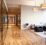Commercial Property Management Company Cleaning Service - Pure Clean hardwood floor in living room